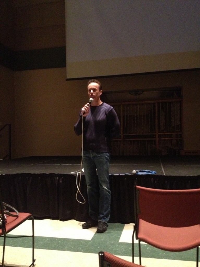 Answering questions from the audience after the trailer screened. 
