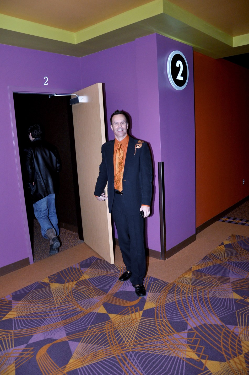 Welcoming the final guests to our screening.