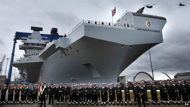 In a new article this week, it looks like the Royal Navy's HMS Queen Elizabeth may belong to the US Marines rather than Britain. In SOS United States, President and Prime Minister plan to merge their respective militaries.