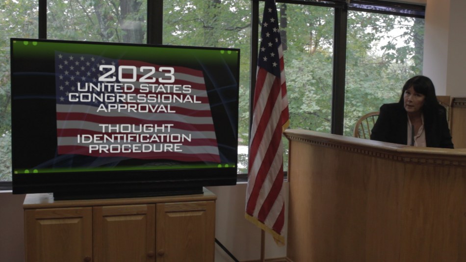 In the sequel to Justice Is Mind a congressional hearing is convened in 2026 to address a new development in mind reading by Reincar Scientific.