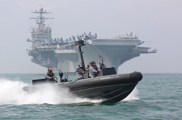 Just like in SOS United States an aircraft carrier from the United States arrives in the United Kingdom. Pictured -  USS Theodore Roosevelt will anchor off Stokes Bay, Gosport.
