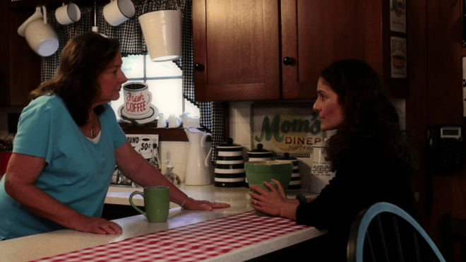 Gail Sullivan as Helen Granger with Robin Ann Rapoport as Margaret Miller in Justice Is Mind.